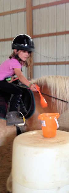 Rider enjoying an open riding class at Pretty Pony Pastures